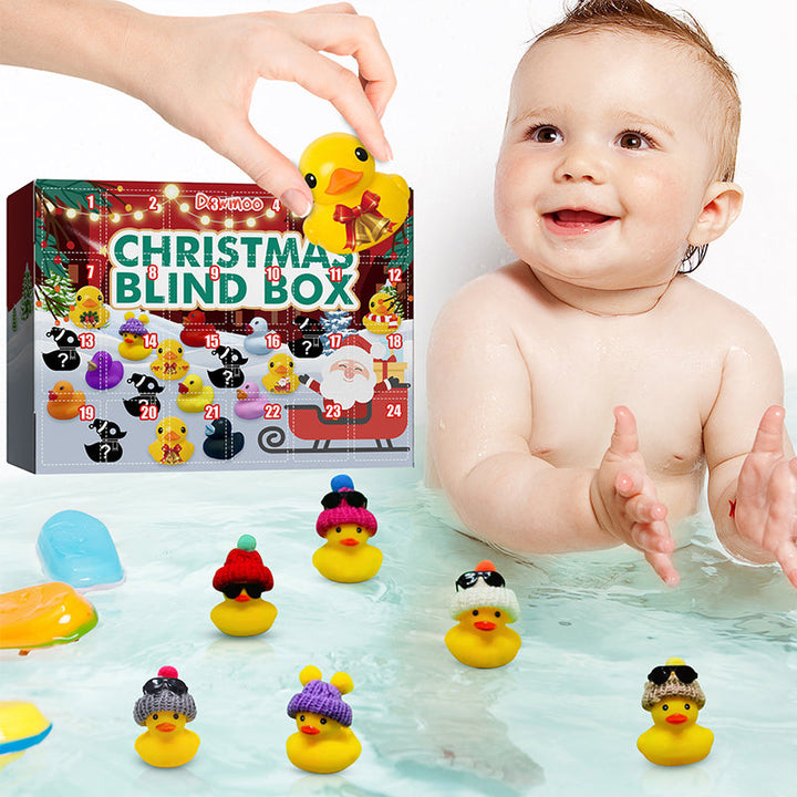 "Färgglada gummiankor i juldesign, adventskalender för barn, nedräkning till jul, leksak i set om 24 ankfigurer."