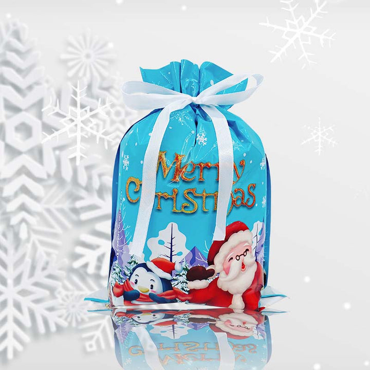 "Festlig julpresentpåse med dragsko, röd och grön mönster, säker förslutning, perfekt för gåvor och dekoration."