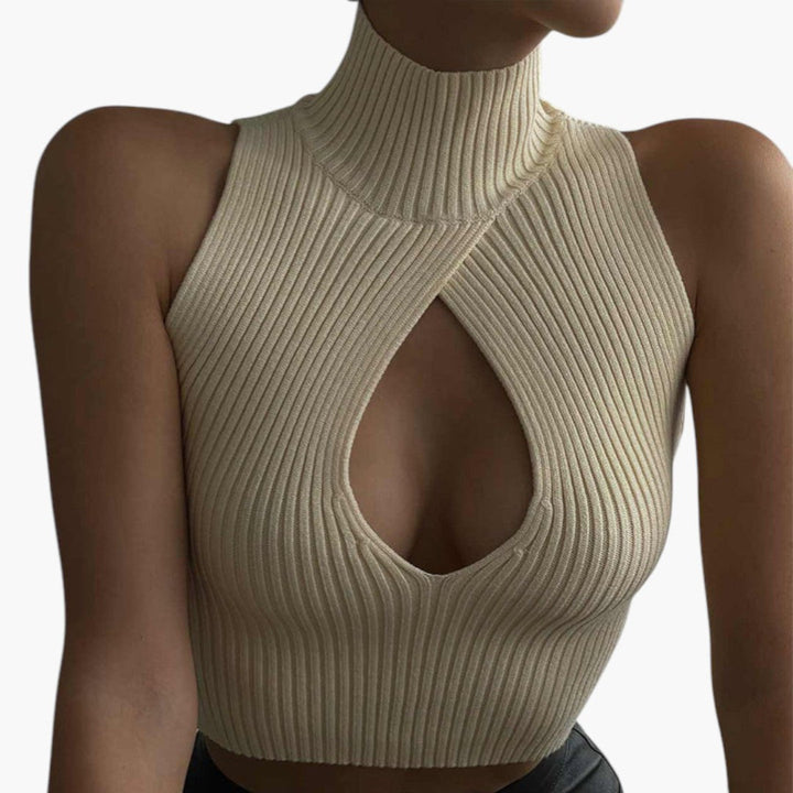 Trendig croppad topp med chic utskärning & hög krage. Ärmlös ribbad design, stilren festtopp.