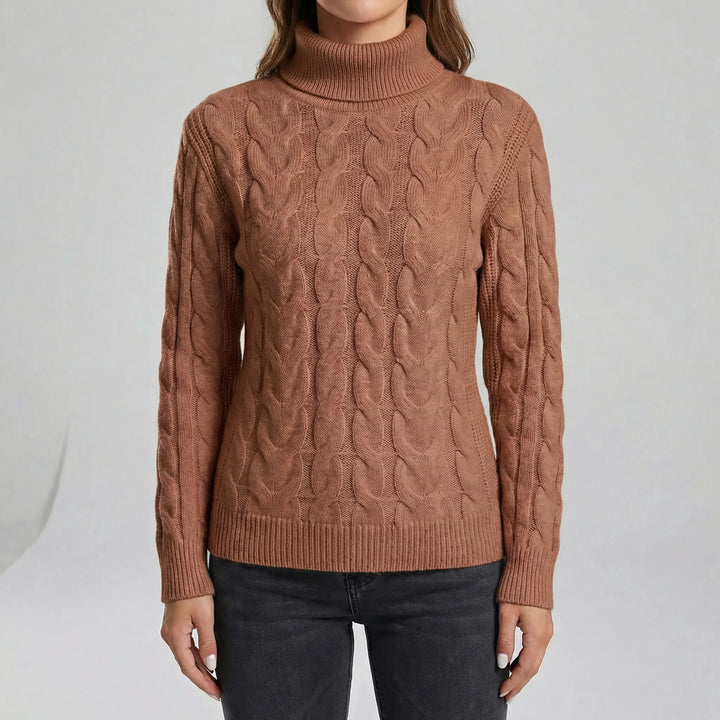 Vardagslook med denna varma figursydda damtröja. Långärmad polotröja.