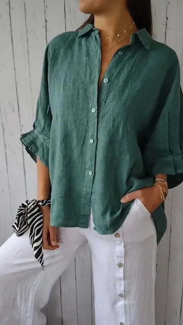 Elegant damblus med ledig passform och klassisk krage i fin kvalitet