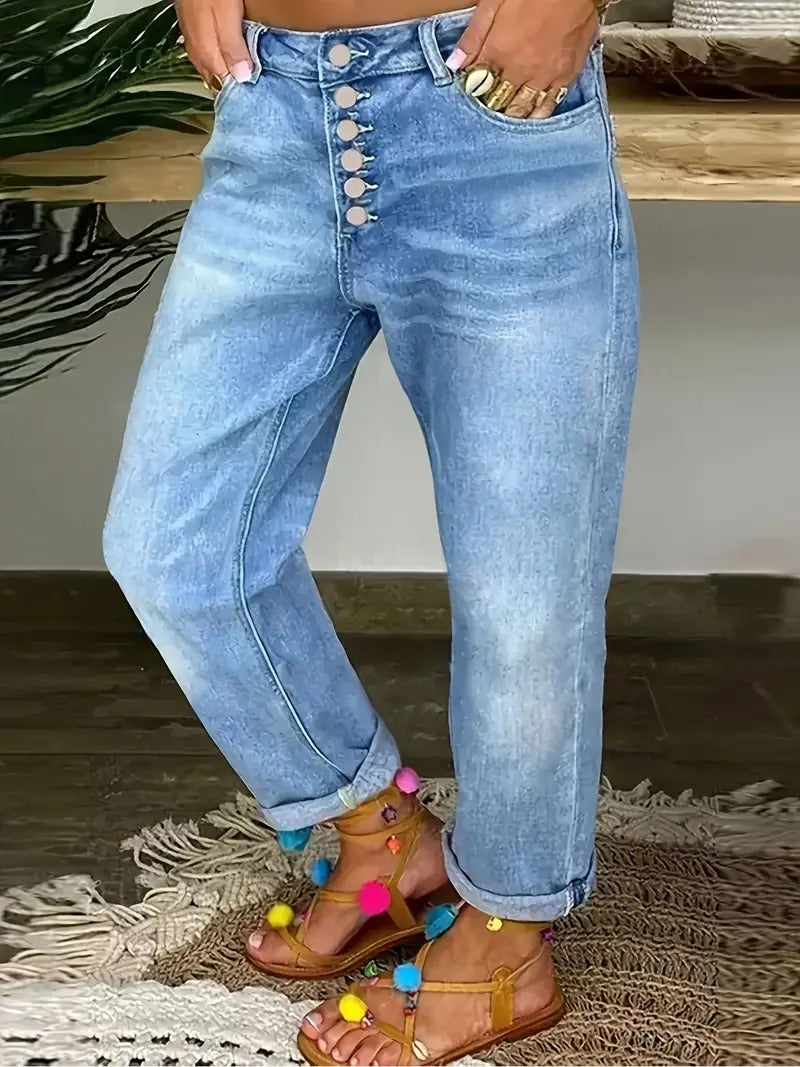 Framifrån av dam jeans med hög stretch och knäppning