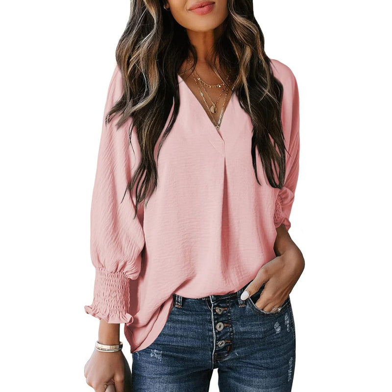 Vit dam blus med v-ringning och elegant passform för stilfull vardagslook