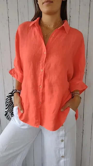 Orange damblus med klassisk design och ledig stil