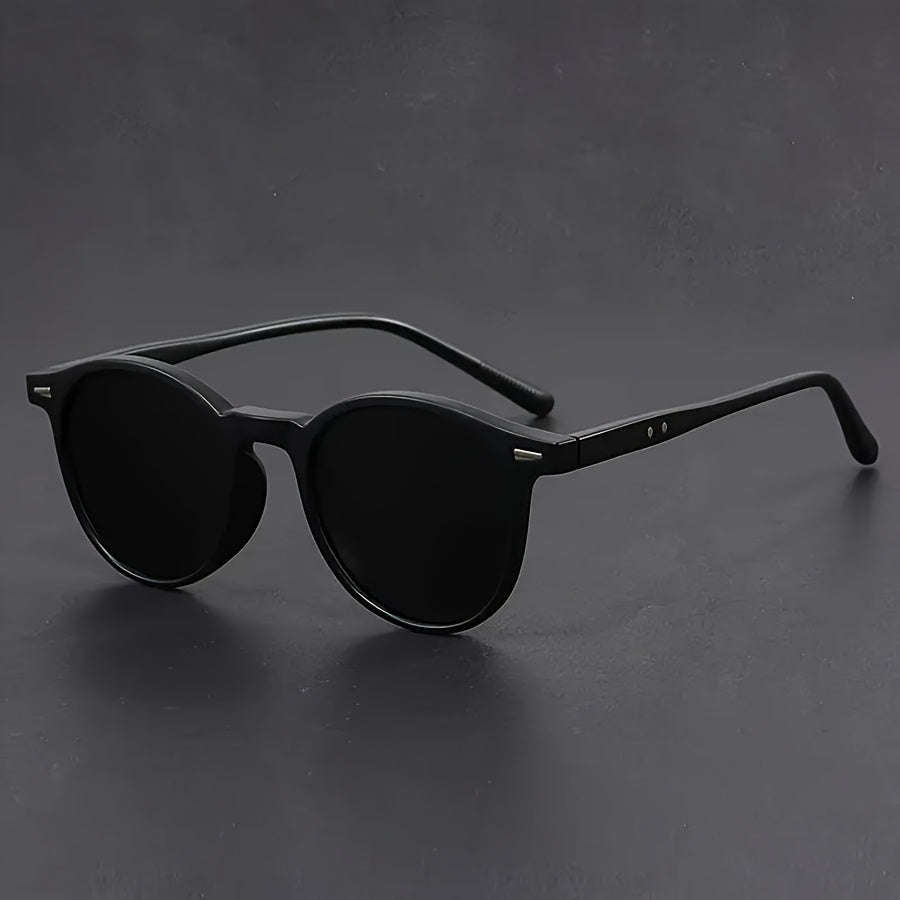 Svarta unisex solglasögon med rund retro form för en stilsäker sommarlook och vardagsstil
