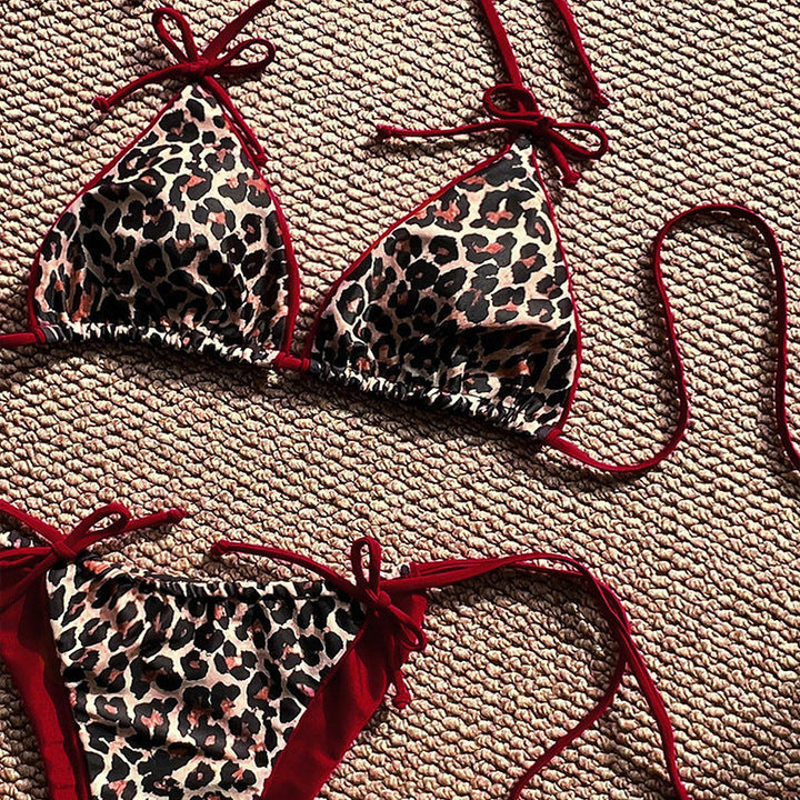 Dam triangelbikini med rosa zebratryck, justerbar passform, idealisk för sommar och sol.