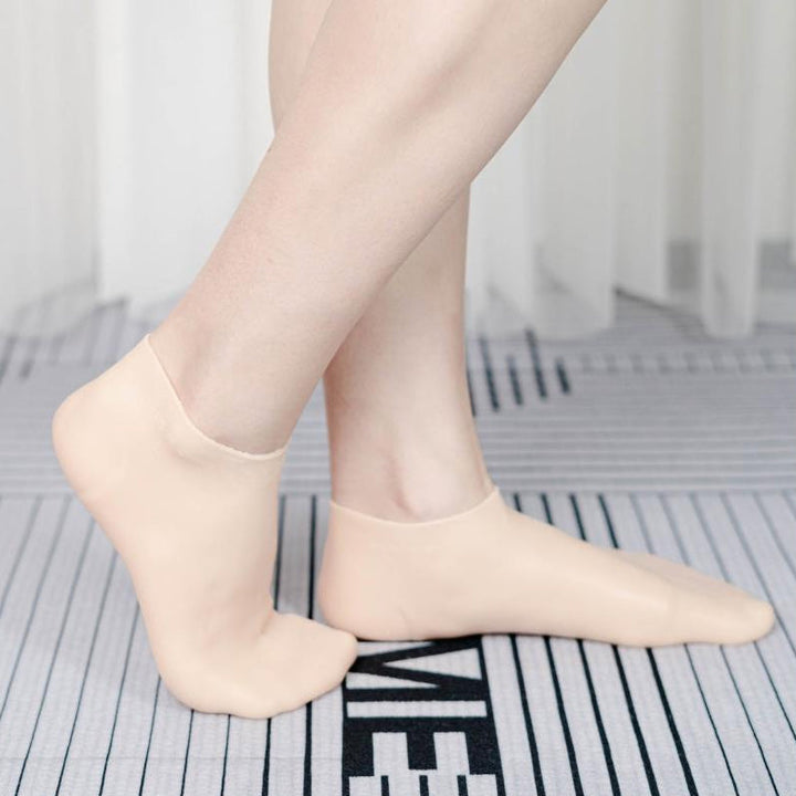 "Fuktgivande silikonsockar för kvinnor, hudfärg med antihalkdesign, perfekt för torra och spruckna fötter - fotspa & pedikyr.