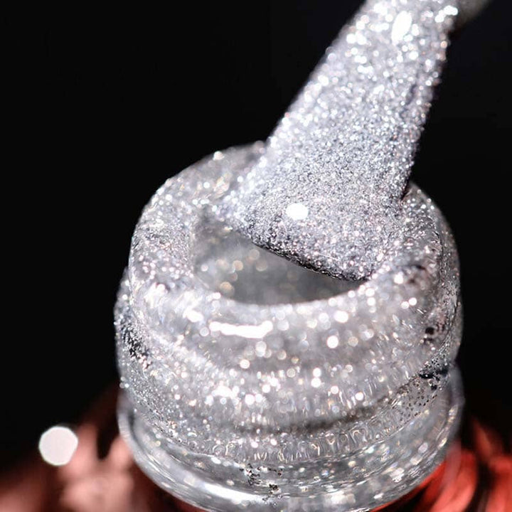 "Glittrande nagellack med hög densitet, skimrande spegelglans, långvarig hållbarhet, perfekt för salongresultat hemma."