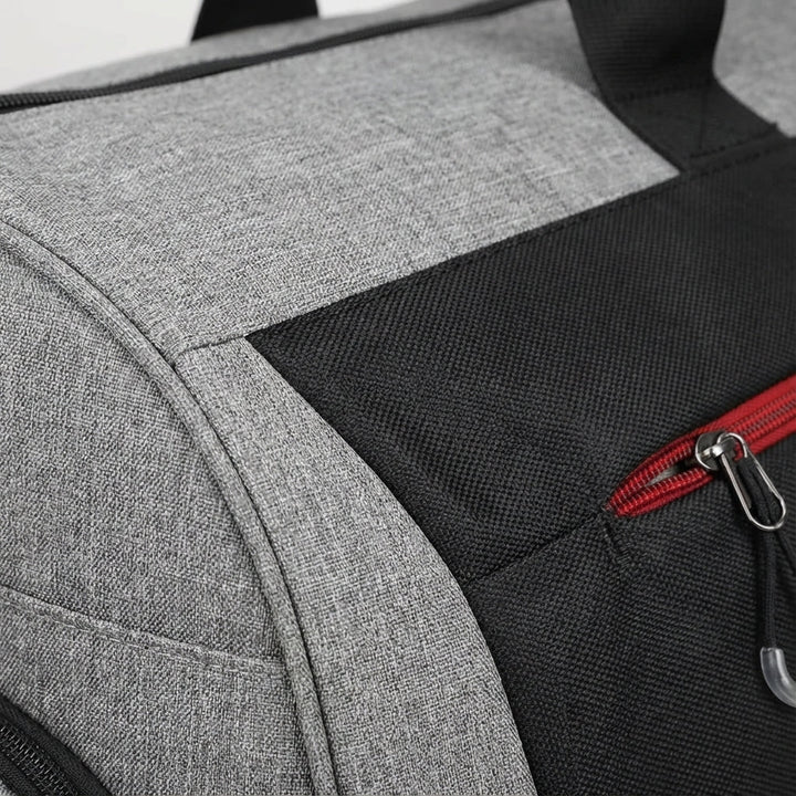 Unisex 30L kompakt weekendbag i grå/svart, idealisk som gymväska eller liten resväska.