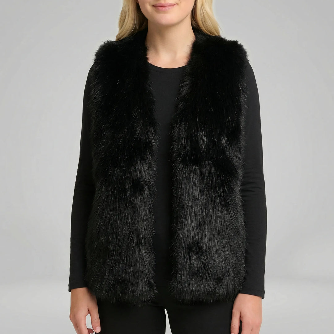 Lyxig dam fuskpälsväst, ärmlös, varm och elegant. Ett perfekt plagg för höstmode och kyliga vintrar.