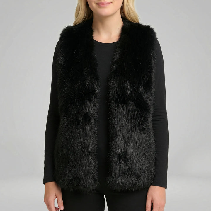 Lyxig dam fuskpälsväst, ärmlös, varm och elegant. Ett perfekt plagg för höstmode och kyliga vintrar.