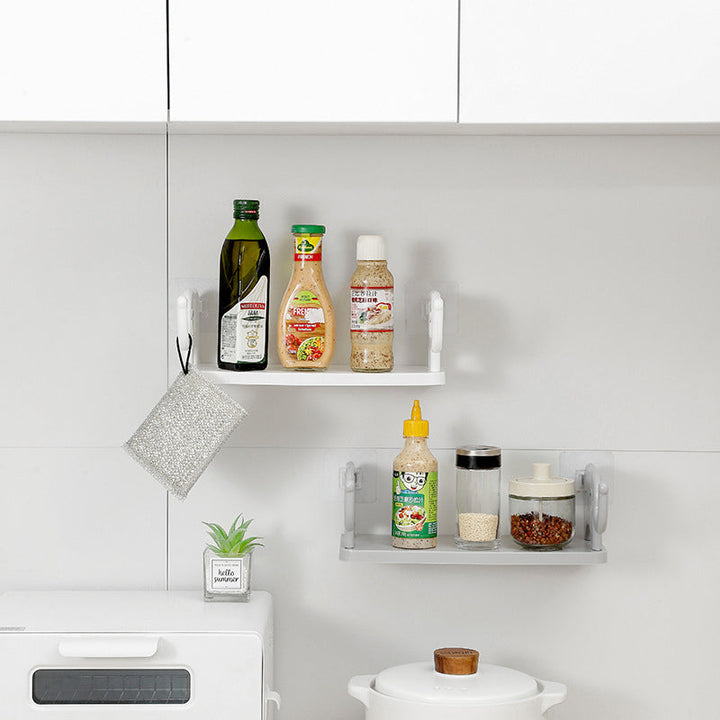 "Grå elefantformad hylla i plast, enkel och stilren, för väggförvaring och dekoration i hemmet, 32.5x20x11.5 cm."
