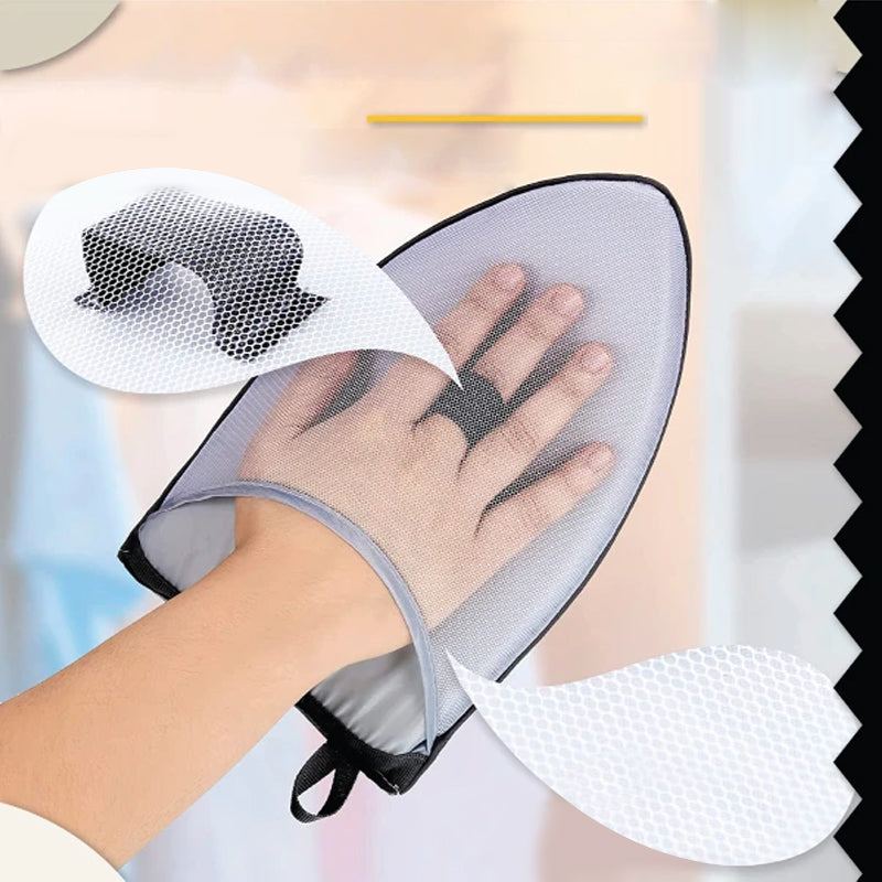 "Grå ergonomisk värmebeständig ångbåtshandske för alla handstorlekar, erbjuder säker hantering av varma kläder."
