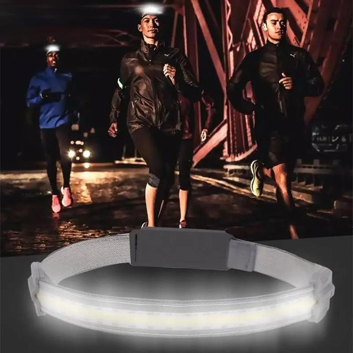 "Grå unisex USB-uppladdningsbar pannlampa, lätt och stilren för löpning, vandring och cykling."