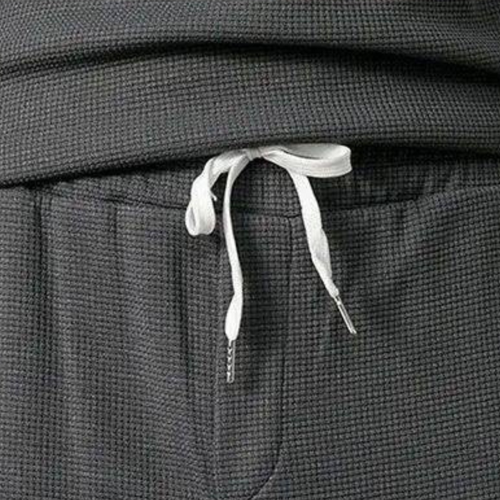 Stilfull herrjoggingdress i grått för höstmode och avkoppling