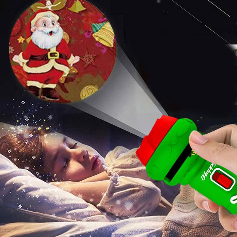 "Grön och röd barn julprojektionsficklampa, plastleksak som projicerar historier på väggen, för barnens fantasi."
