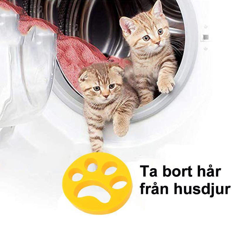 "Grön Tass Djurhårsborttagare för tvättmaskin som tar bort djurhår och damm från kläder effektivt."
