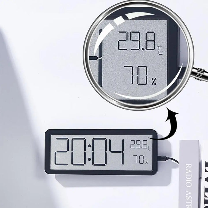 Stilig svart digital klocka för vägg med visning av temperatur och tid