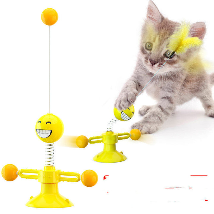 Gul interaktiv snurrande fjäderbollskattleksak. Stimulerar din innekatt med rolig husdjurslek.