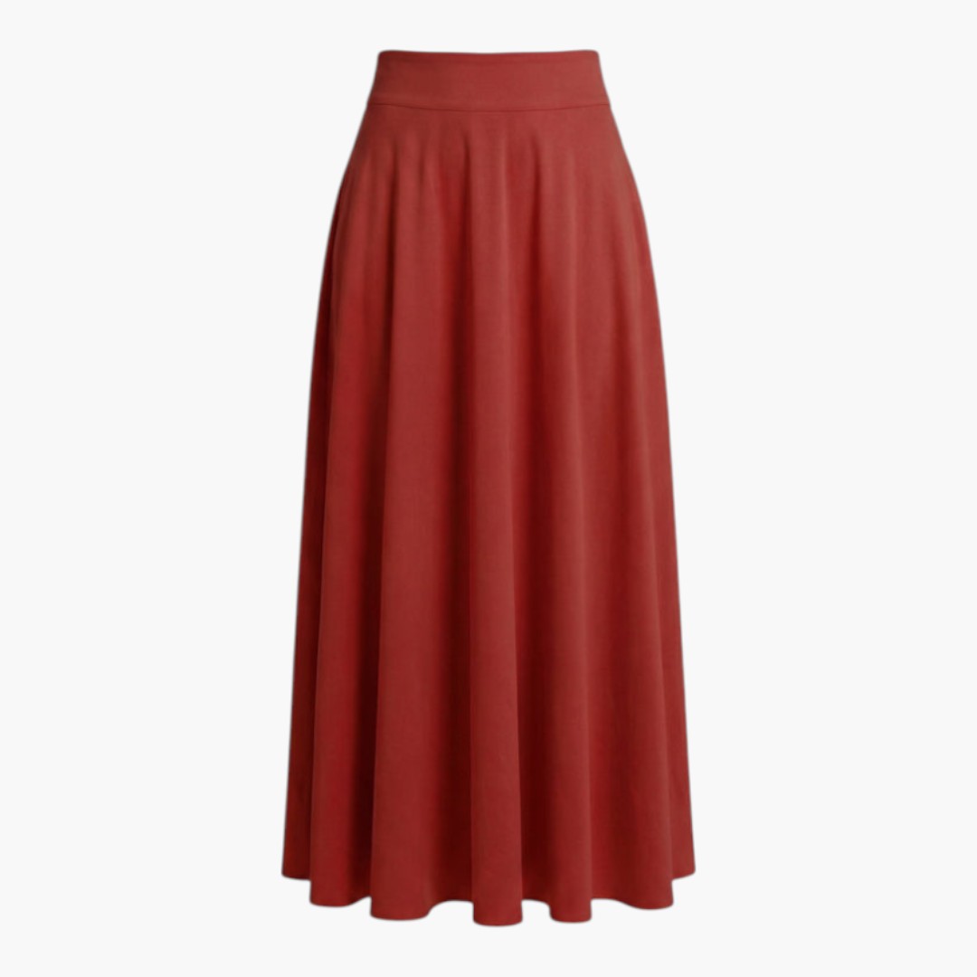 Stilren dam maxikjol i svart, högmidjad med brett midjeband och fickor. Perfekt långkjol för vardag, vår och sommarfest.