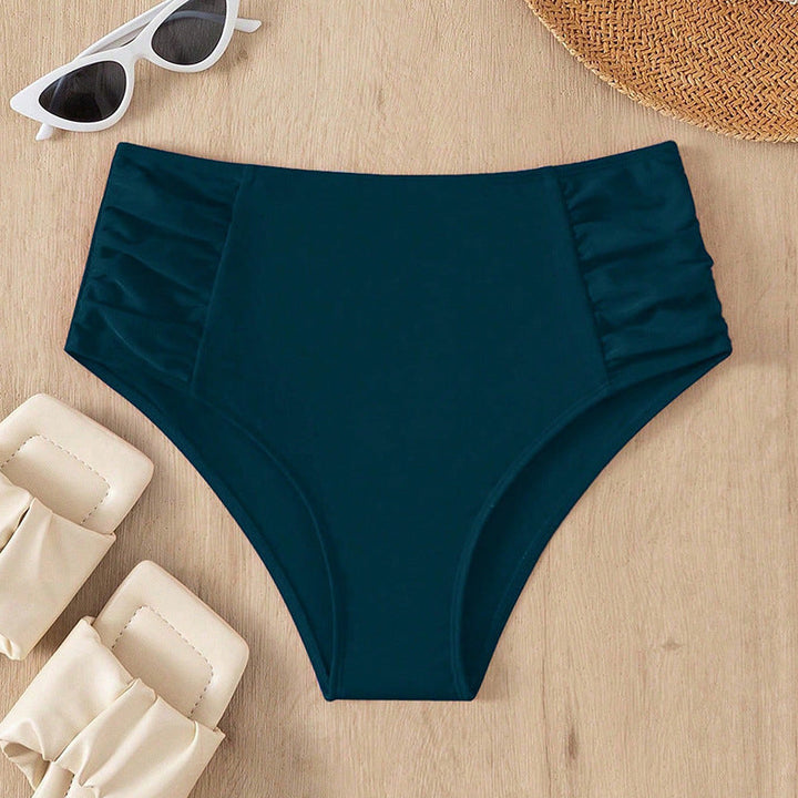 Snygg högmidjad bikiniunderdel med volang för dam. Sköna stretchiga badkläder för strand och pool.