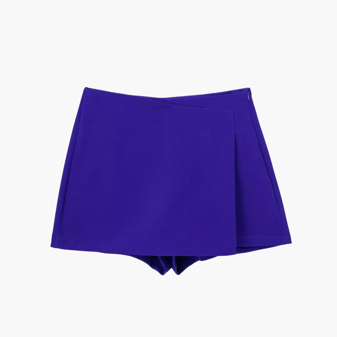 Trendig högmidjad skort, omlottdesign som kombinerar en snygg kjol med praktiska shorts.