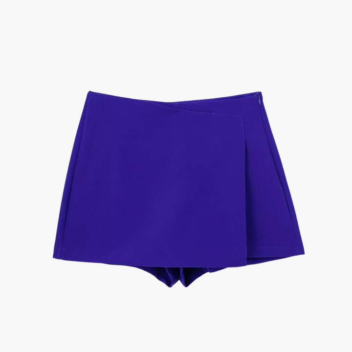Trendig högmidjad skort, omlottdesign som kombinerar en snygg kjol med praktiska shorts.