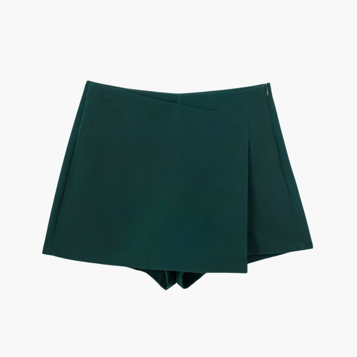 Omlott-skort för dam, högmidjad och mångsidig, ger kjolens elegans med shortsens funktion.