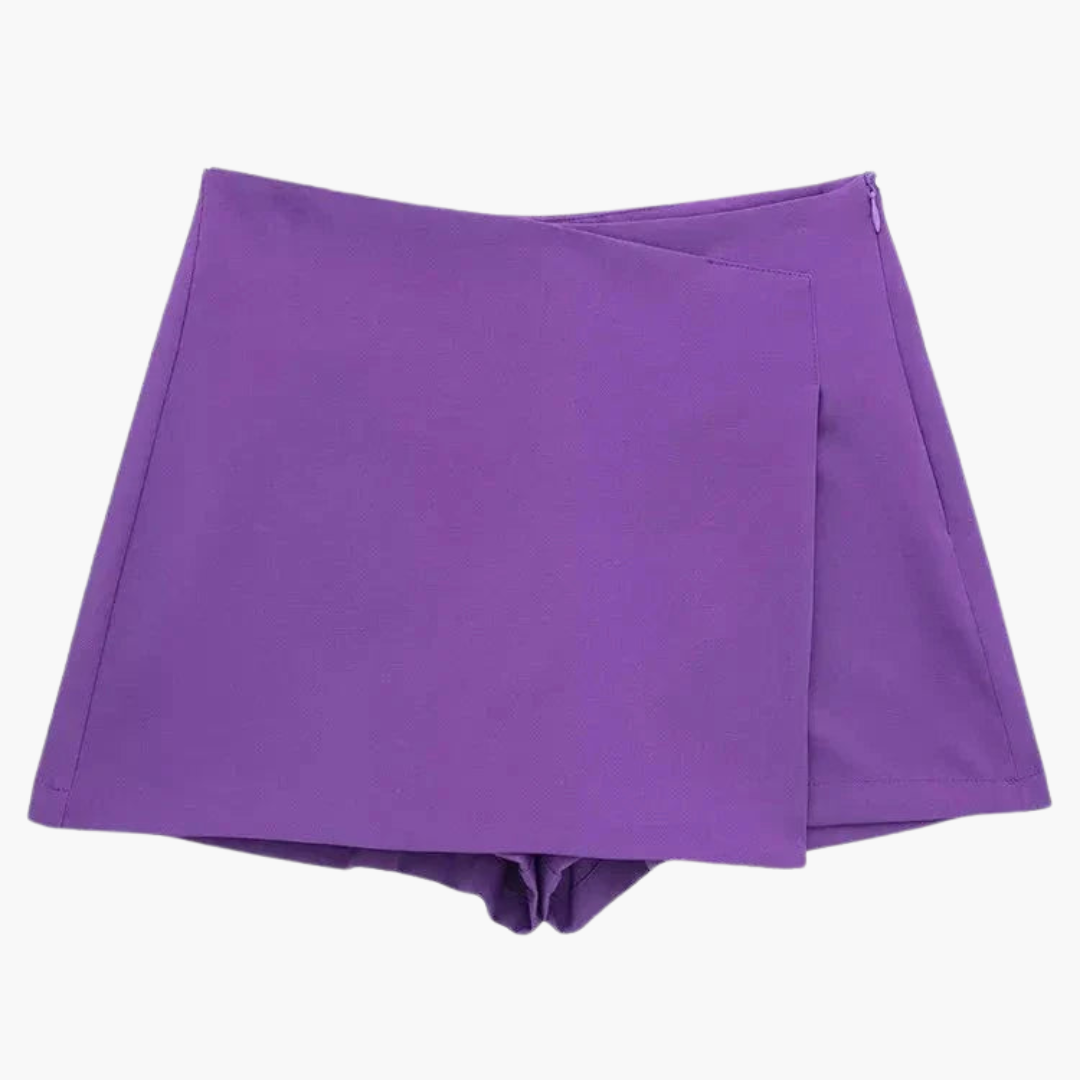 Färgstark minikjol i skort-stil, kvinnlig och modern sommarstil med inbyggda shorts.