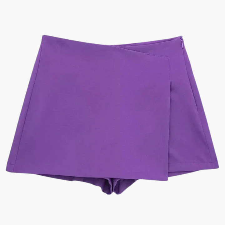 Färgstark minikjol i skort-stil, kvinnlig och modern sommarstil med inbyggda shorts.