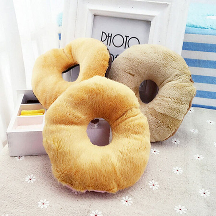 Robust donut hundleksak, idealisk för valpar som älskar att tugga. Främjar lek och mental stimulans för din hund.