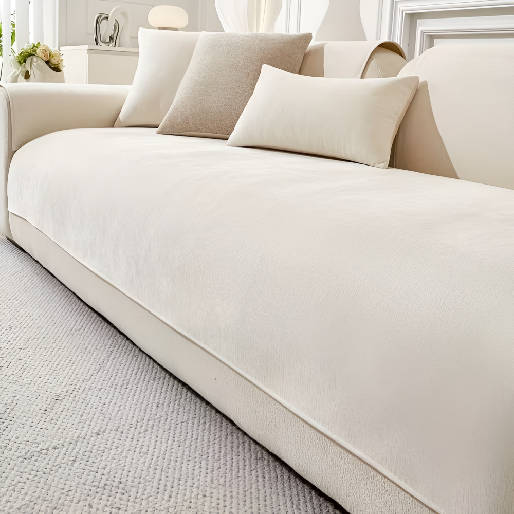 Detaljbild som visar halkfritt chenille sofföverdrag som stannar på plats. Optimalt skydd för din soffa, heminredning.