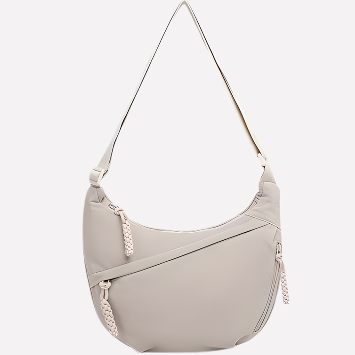 Ny beige halvmåneformad crossbody-väska i snygg design