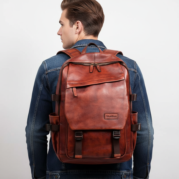 Elegant Skinnato läderryggsäck för arbete, med laptopfack. Professionell unisex arbetsväska.