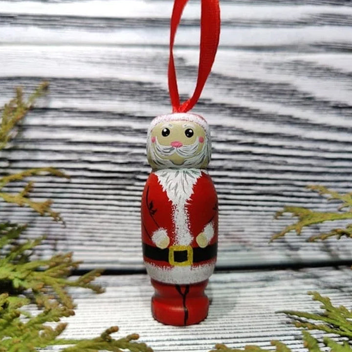 Handgjord tomteleksak i färgglatt trä, perfekt som julprydnad med överraskningseffekt för glädje och skratt.