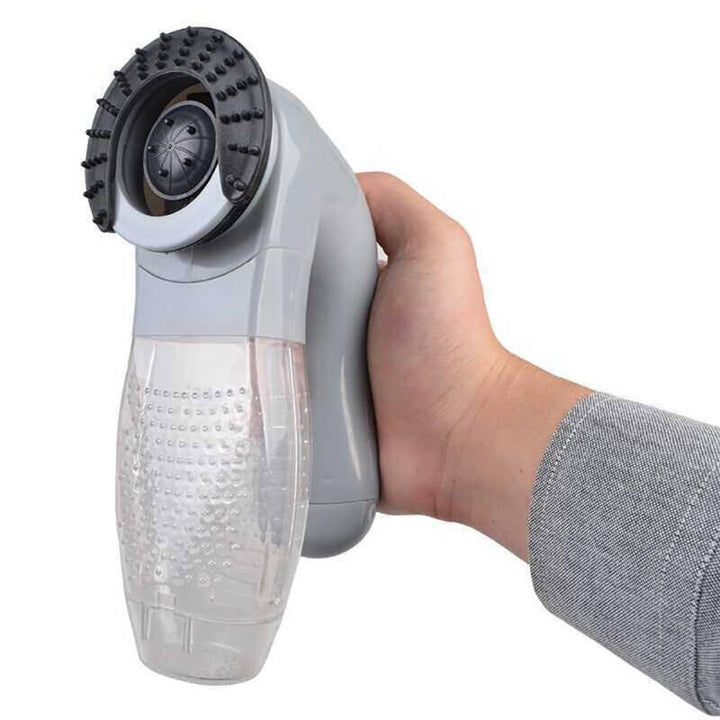 "Handhållen djurhårsdammsugare med kompakta design, trådlös funktionalitet, mjuka massagenubbar och kraftigt sug."