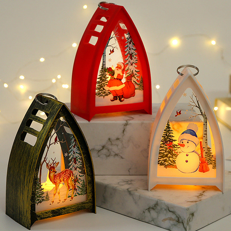 Handmålad LED juldekoration med rådjurdesign för julbord, skapar en magisk och festlig stämning i hemmet.