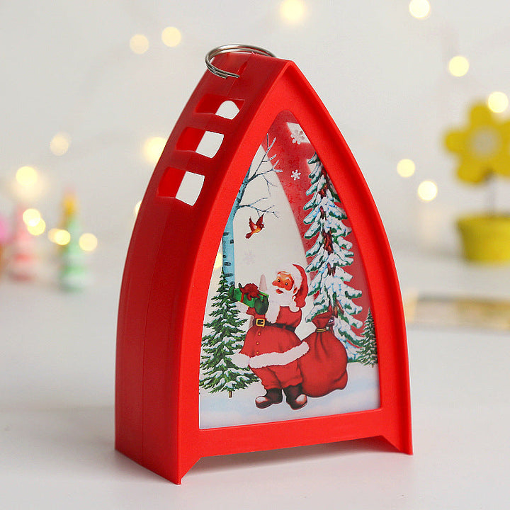 Handmålad LED juldekoration med snögubbedesign för julbord, skapar en magisk och festlig stämning i hemmet.