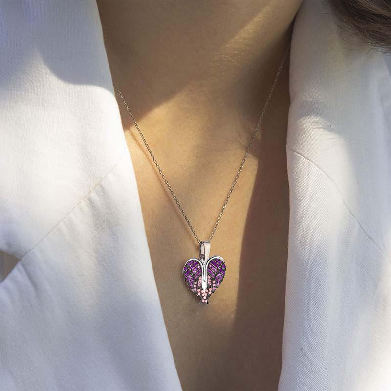 "Hängande halsband med hjärta och änglavingar, silverglänsande, smycket för damer, symbol för skydd och hopp."