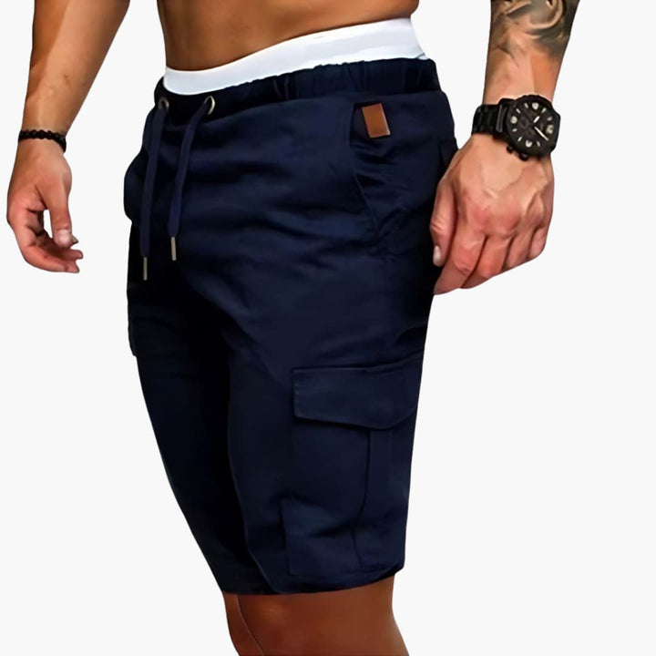 Mångsidiga herr cargoshorts med dragsko för en bekväm, avslappnad passform. Perfekt för sommarens aktiviteter.