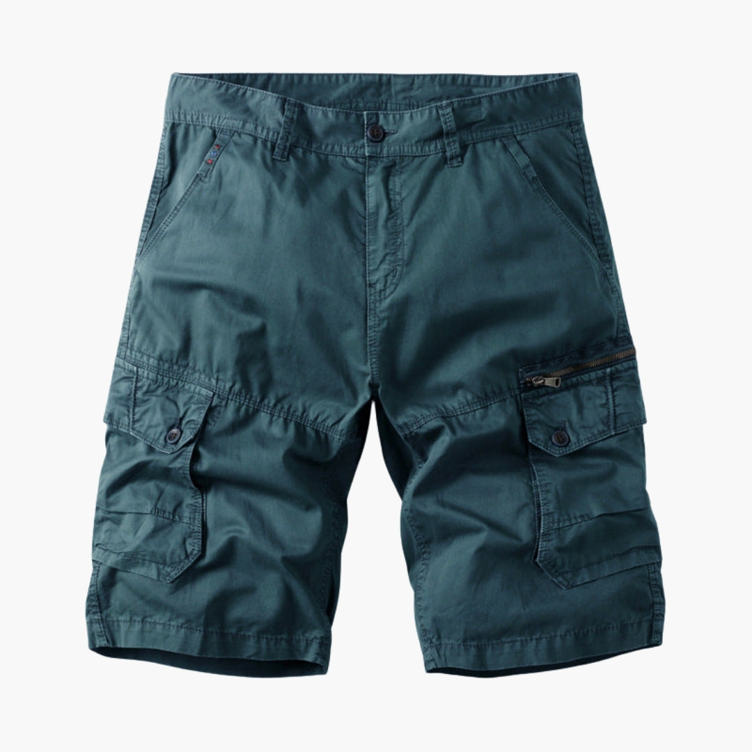 Detalj av slitstarkt tyg på Herr Cargoshorts; bekväma herrshorts med praktiska fickor för sommar och fritid.
