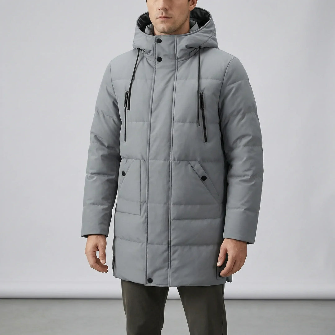 Slitstark herr vinterjacka med huva, designad för extrem kyla. Vindtät och vattenavvisande parkas.