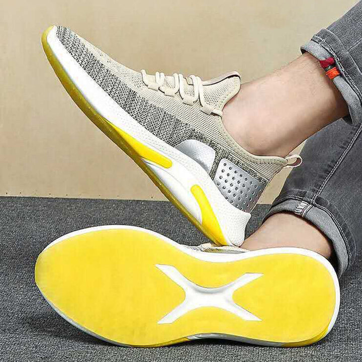 Herr lättvikts sneakers i färgglatt mönster, detaljerad bild som visar ventilationsdesign.