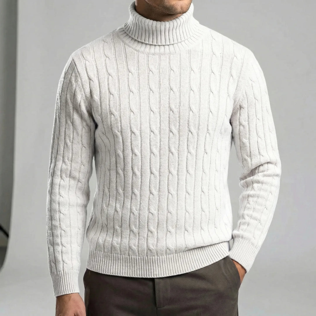 Elegant herr polotröja med strukturmönster. Bekväm långärmad tröja, ett måste i höstgarderoben.