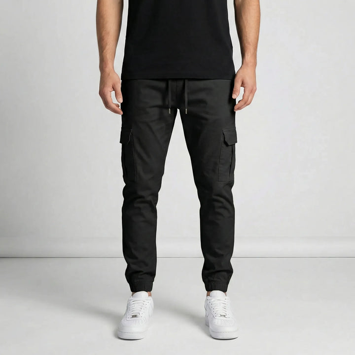 Moderna herr Slim Tapered Cargo joggerbyxor. David-modell, bekväma och stilrena fritidsbyxor.