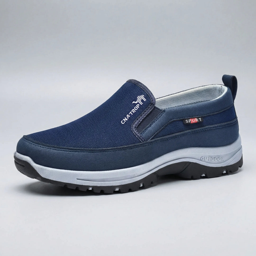 Herr John slip-on promenadskor i elegant brun, designade för optimal komfort och dagligt stöd.