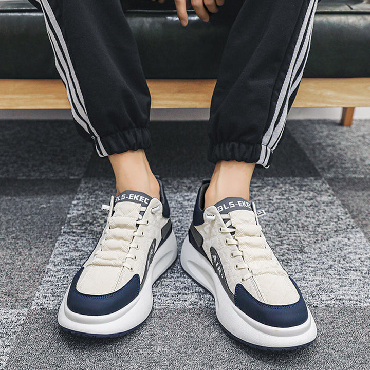 Herr Sneakers med tjock sula i beige, grå och svart. Elegant design, slitstark och bekväm, perfekt för sport och vardag.
