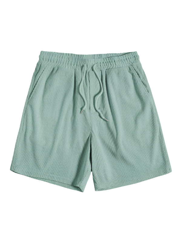 Herr sommarmode: Tvådelat randigt set med t-shirt och shorts för en snygg stil.