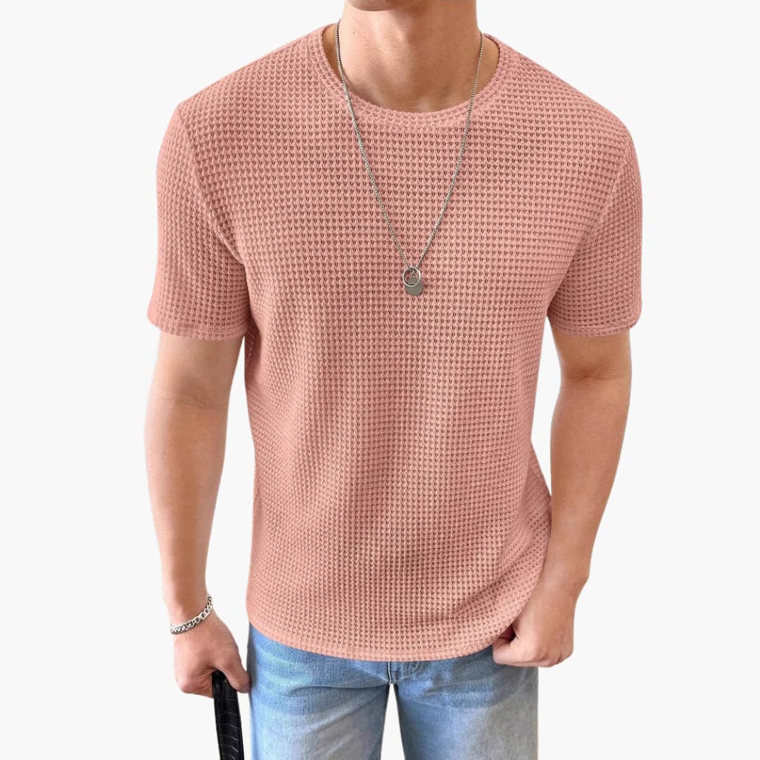 Stilren herr T-shirt med våffelstruktur och rund hals. Kortärmad, bekvämt basplagg för vardagen.