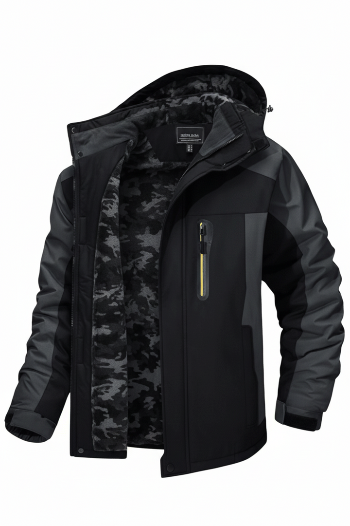 Herr vinterjacka Aidan i höstlandskap. En varm & vindtät outdoorjacka för aktiva män i urban stil.